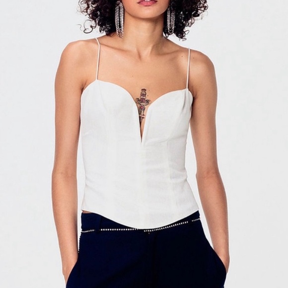 Like new condition Celeste Moire Top in Blanc
For Love & Lemons
Color:Blanc - Picture 7 of 11